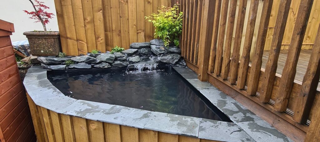 Raised Wooden Pond With A Waterfall