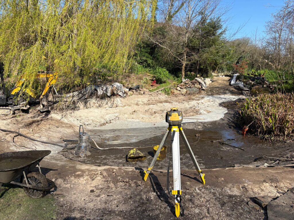 Laser level used for wildlife pond construction to set accurate water levels and marginal planting areas