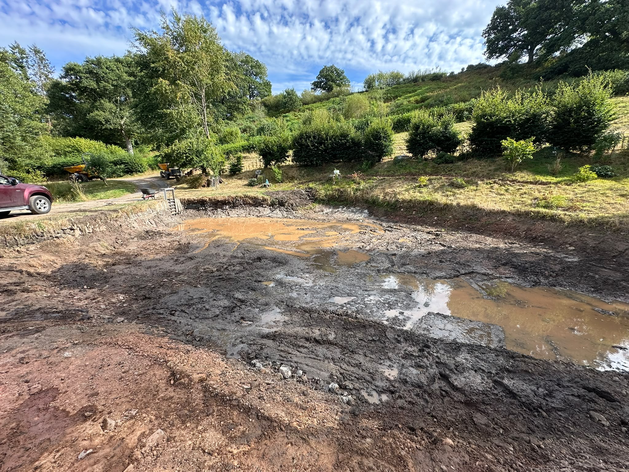 Historic pond basin cleared after desilting and repair work in North Devon