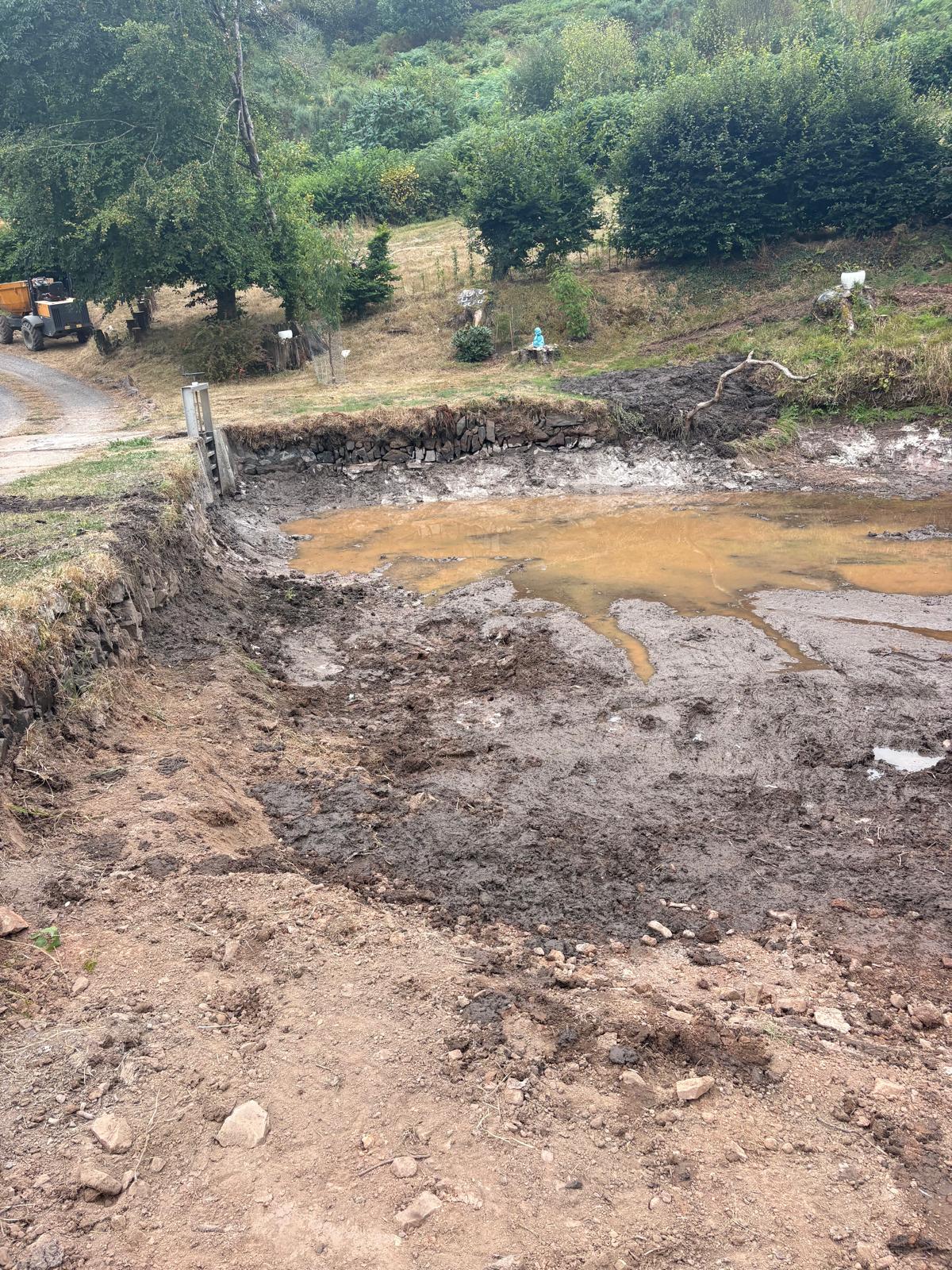 Repaired sluice and cleared pond basin after Phase 1 works