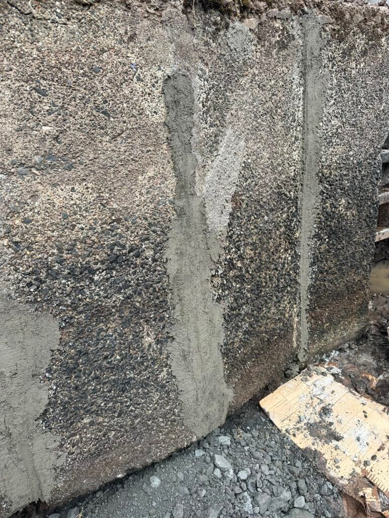 Repaired masonry around the pond sluice